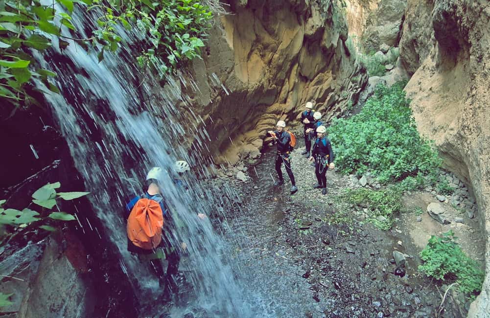 Gran Canaria: Canyoning Adventure in the Green Heart Jungle - First action: rock slides and learning how to move with water