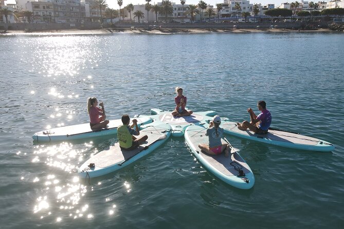 Gran Canaria: Small Group Sup Yoga Experience. - The Paddle Surf Lesson: How You Go from Beach to Anchored Floating Studio